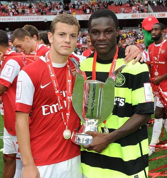 Jack Wilshere and Emmanuel Frimpong (Arsenal) with the Emirates Cup Trophy
