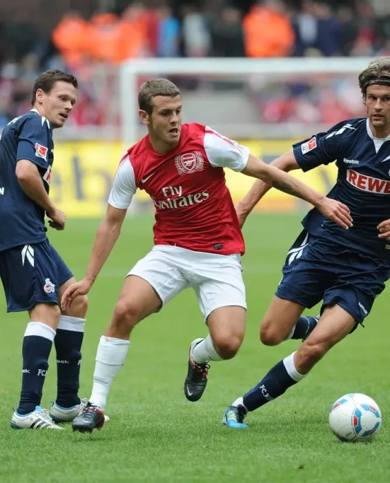 Framed Print : Jack Wilshere Faces Off Against Martin Lanig in Cologne Friendly