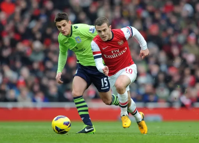 Framed Print : Jack Wilshere Outmaneuvers Ashley Westwood: Arsenal vs. Aston Villa, Premier League 2012-13