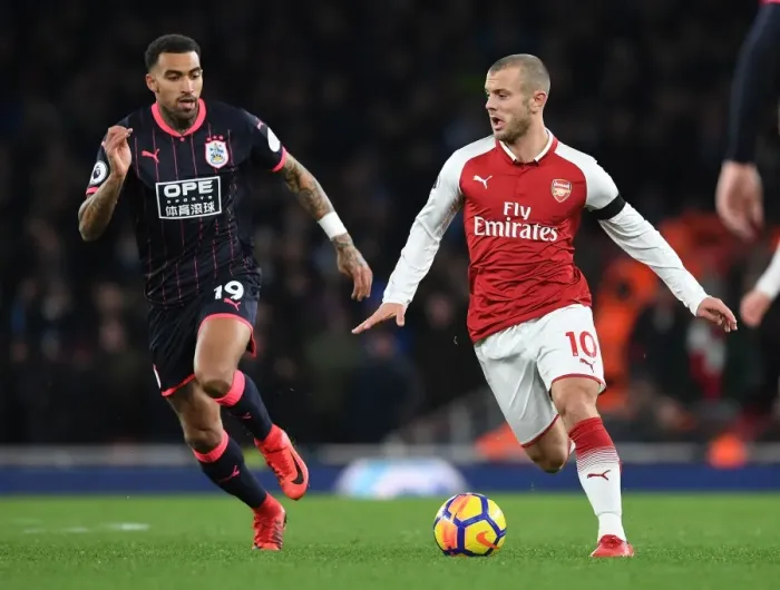 Framed Print : Jack Wilshere Outmaneuvers Danny Williams: Arsenal vs Huddersfield Premier League Clash Framed Print : Jack Wilshere Outmaneuvers Danny Williams: Arsenal vs Huddersfield Premier League Clash