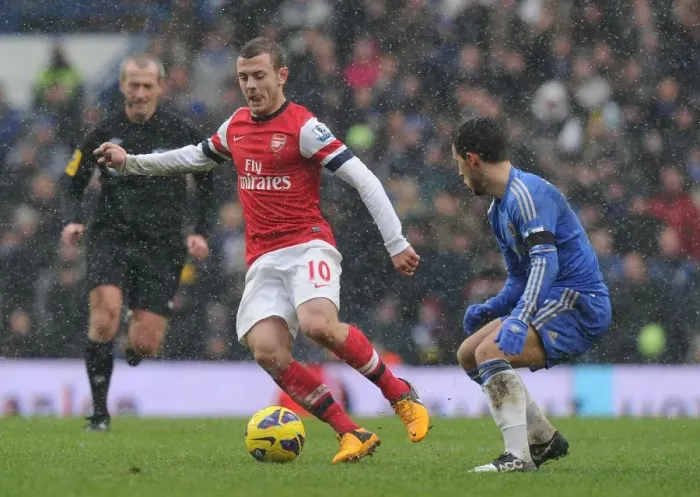 Framed Print : Jack Wilshere Outmaneuvers Eden Hazard: Intense Rivalry in Chelsea vs Arsenal Premier League Clash (2012-13)