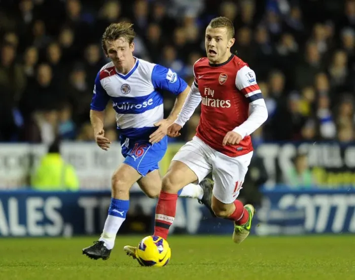 Framed Print : Jack Wilshere Outpaces Jay Tabb: Reading vs Arsenal, Premier League 2012-13