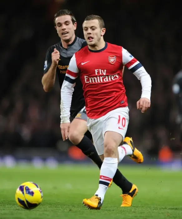 Framed Print : Jack Wilshere Outpaces Rival Jordan Henderson: Intense Arsenal vs. Liverpool Rivalry on the Premier League Field Framed Print : Jack Wilshere Outpaces Rival Jordan Henderson: Intense Arsenal vs. Liverpool Rivalry on the Premier League Field