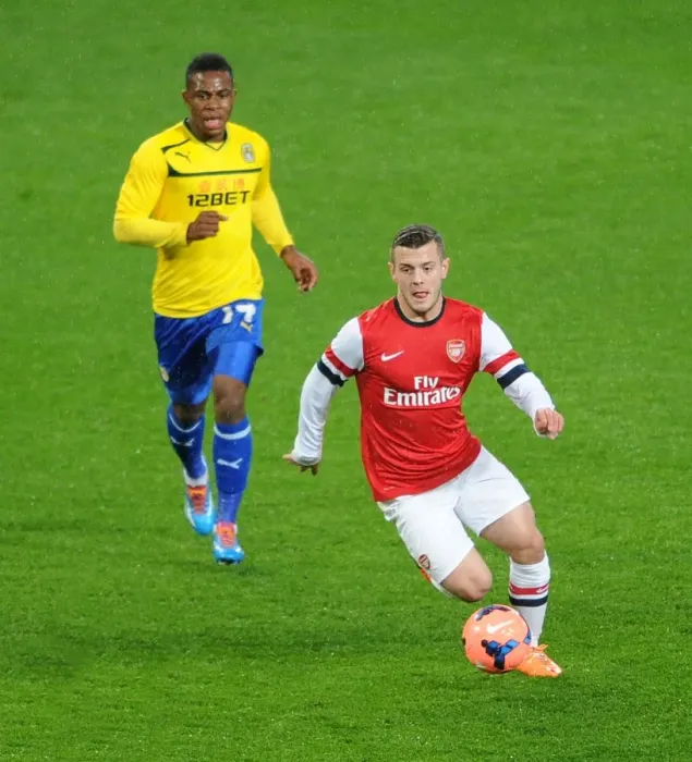 Framed Print : Jack Wilshere Outruns Franck Moussa: Arsenal vs Coventry City FA Cup Fourth Round