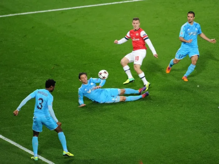 Framed Print : Jack Wilshere Scores Dramatic Goal Past Lucas Mendes and Nicolas N'Koulou: Arsenal vs. Olympique de Marseille, UEFA Champions League, 2013 Framed Print : Jack Wilshere Scores Dramatic Goal Past Lucas Mendes and Nicolas N'Koulou: Arsenal vs. Olympique de Marseille, UEFA Champions League, 2013