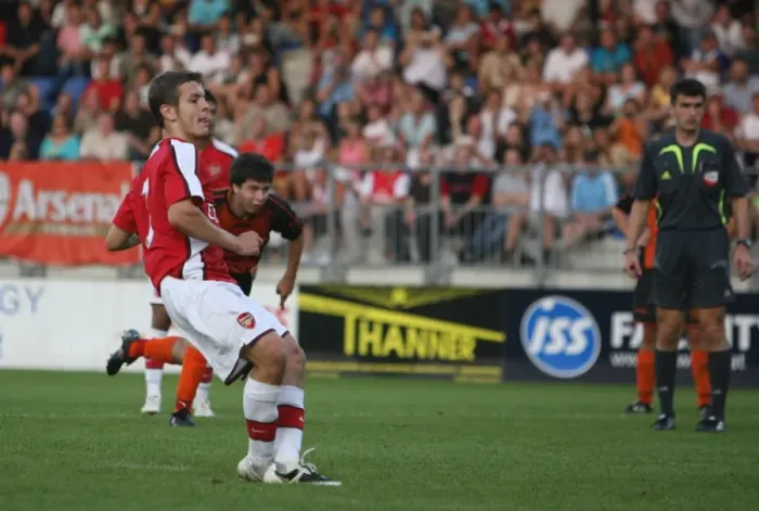 Framed Print : Jack Wilshere shoots past Burgenland goalkeeper Johannes Framed Print : Jack Wilshere shoots past Burgenland goalkeeper Johannes