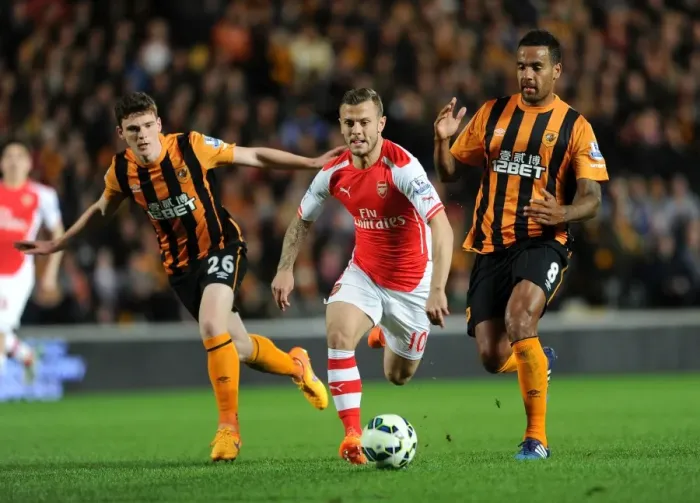 Framed Print : Jack Wilshere Splits Hull City's Defense: Arsenal's Midfield Maestro in Action (2014 / 15 Premier League)