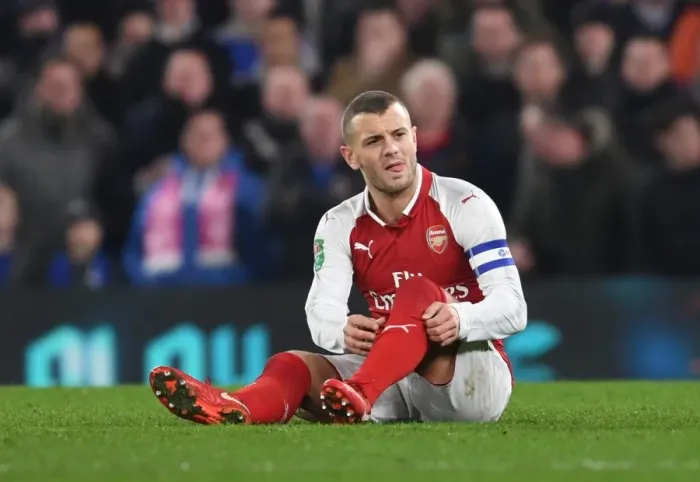 Framed Print : Jack Wilshere Suffers Injury: Chelsea vs Arsenal, Carabao Cup Semi-Final