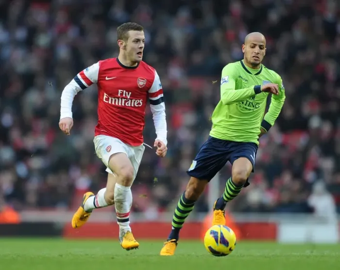 Framed Print : Jack Wilshere Surges Past Karim El Ahmadi: Arsenal vs. Aston Villa, Premier League 2012-13
