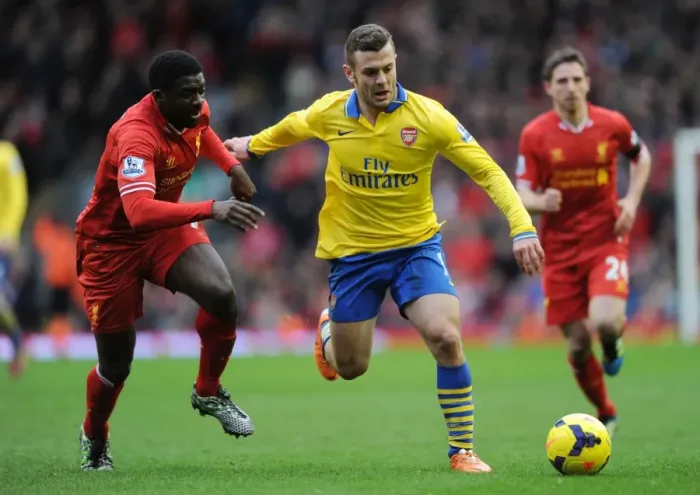 Framed Print : Jack Wilshere Surges Past Kolo Toure: Liverpool vs Arsenal, Premier League 2013-14 Framed Print : Jack Wilshere Surges Past Kolo Toure: Liverpool vs Arsenal, Premier League 2013-14