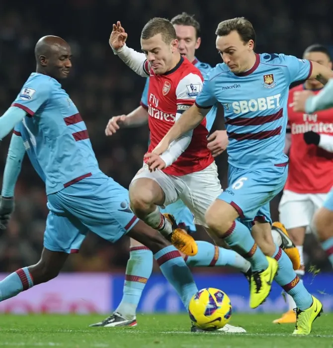 Framed Print : Jack Wilshere Tackles Alou Diarra and Mark Noble: Arsenal vs West Ham United, Premier League 2012-13