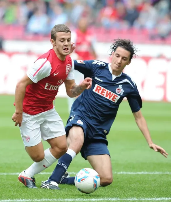 Framed Print : Jack Wilshere Takes on Pedro Geromel: Cologne vs. Arsenal Pre-Season Clash Framed Print : Jack Wilshere Takes on Pedro Geromel: Cologne vs. Arsenal Pre-Season Clash