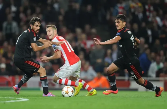 Framed Print : Jack Wilshere vs. Mustafa Pektemek and Ersan Gulum: Intense Face-Off in Arsenal's UEFA Champions League Clash Framed Print : Jack Wilshere vs. Mustafa Pektemek and Ersan Gulum: Intense Face-Off in Arsenal's UEFA Champions League Clash