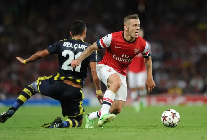 Framed Print : Jack Wilshere vs. Selcuk Sahin: Arsenal's Midfield Battle in Champions League Play-offs (Arsenal v Fenerbahce 2013-14) Framed Print : Jack Wilshere vs. Selcuk Sahin: Arsenal's Midfield Battle in Champions League Play-offs (Arsenal v Fenerbahce 2013-14)