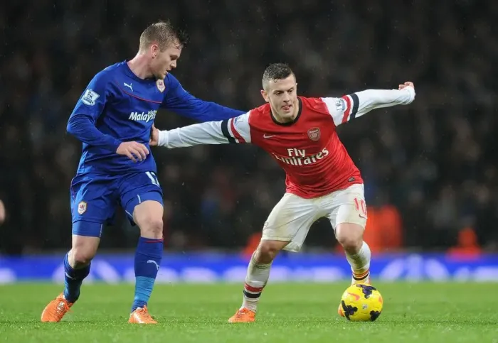 Framed Print : Jack Wilshere vs Aron Gunnarsson: Battle in Midfield - Arsenal v Cardiff City, Premier League Framed Print : Jack Wilshere vs Aron Gunnarsson: Battle in Midfield - Arsenal v Cardiff City, Premier League