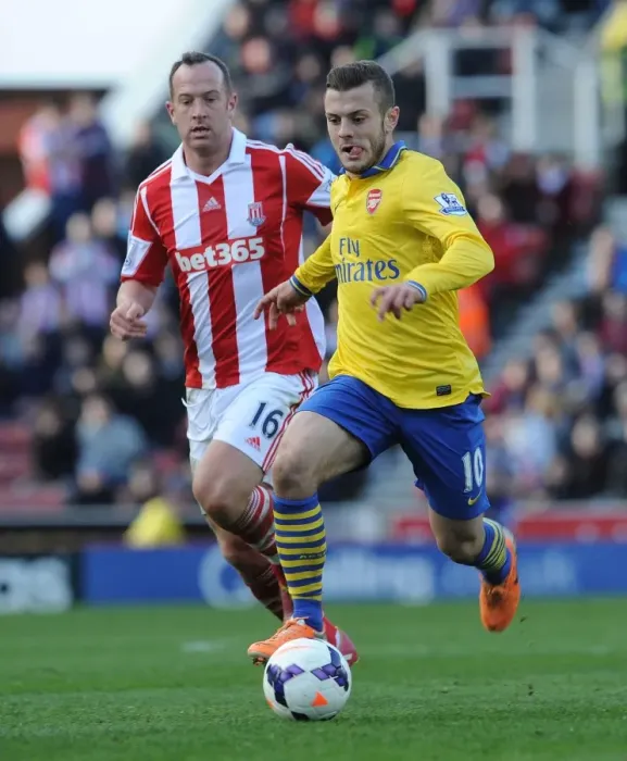Framed Print : Jack Wilshere vs. Charlie Adam: Battle in the Midfield - Stoke City vs. Arsenal, Premier League 2013-14 Framed Print : Jack Wilshere vs. Charlie Adam: Battle in the Midfield - Stoke City vs. Arsenal, Premier League 2013-14