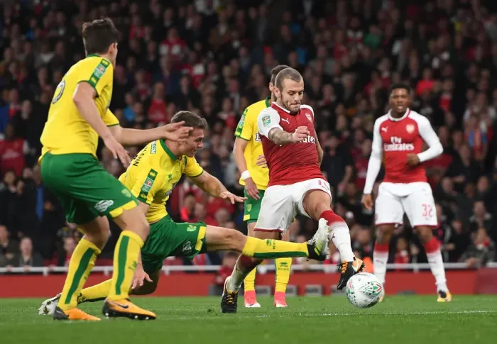 Framed Print : Jack Wilshere vs. Christoph Zimmermann: A Battle in the Carabao Cup Clash Between Arsenal and Norwich Framed Print : Jack Wilshere vs. Christoph Zimmermann: A Battle in the Carabao Cup Clash Between Arsenal and Norwich