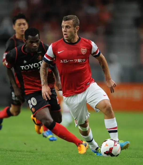 Framed Print : Jack Wilshere vs Danilson: Nagoya Grampus vs Arsenal, 2013