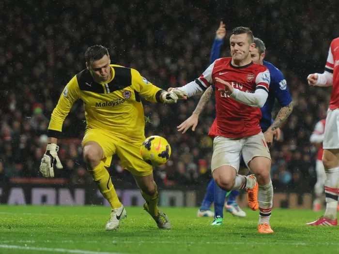 Framed Print : Jack Wilshere vs. David Marshall: Intense Battle at Arsenal's Emirates Stadium (Arsenal v Cardiff City, 2013-14) Framed Print : Jack Wilshere vs. David Marshall: Intense Battle at Arsenal's Emirates Stadium (Arsenal v Cardiff City, 2013-14)