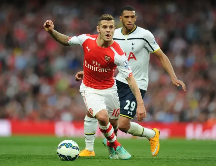 Framed Print : Jack Wilshere vs. Etienne Capoue: Battle in the Midfield - Arsenal v Tottenham, Premier League 2014-15