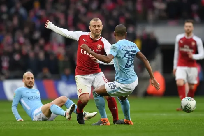 Framed Print : Jack Wilshere vs Fernandinho: Battle at the Carabao Cup Final