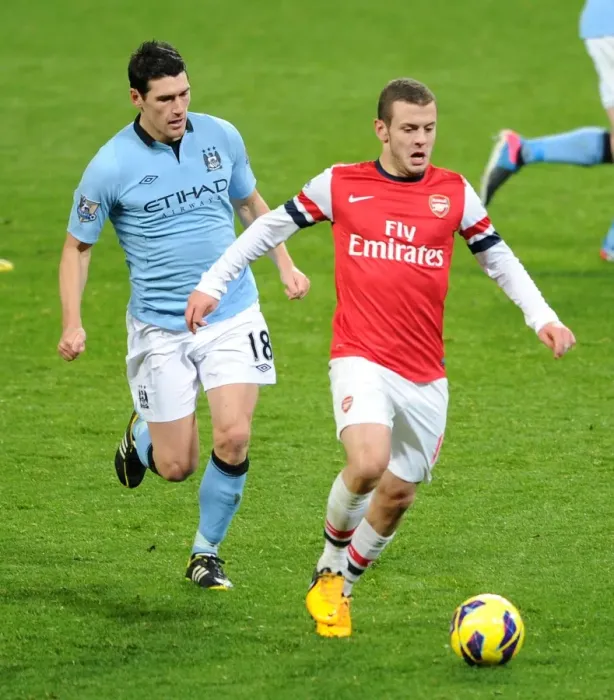Framed Print : Jack Wilshere vs. Gareth Barry: Intense Midfield Battle at Arsenal vs. Manchester City (2012-13) Framed Print : Jack Wilshere vs. Gareth Barry: Intense Midfield Battle at Arsenal vs. Manchester City (2012-13)