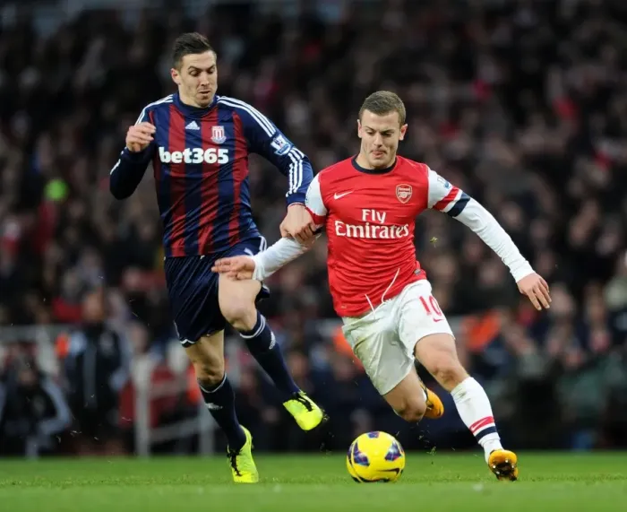 Framed Print : Jack Wilshere vs Geoff Cameron: Intense Battle at Arsenal v Stoke City, Premier League 2012-13 Framed Print : Jack Wilshere vs Geoff Cameron: Intense Battle at Arsenal v Stoke City, Premier League 2012-13