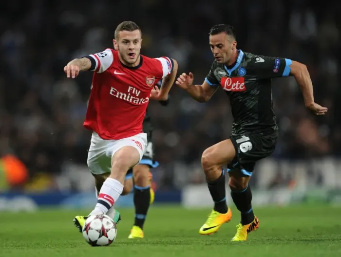 Framed Print : Jack Wilshere vs. Giandomenico Mesto: A Football Battle in the Arsenal vs. Napoli UEFA Champions League Clash, 2013 Framed Print : Jack Wilshere vs. Giandomenico Mesto: A Football Battle in the Arsenal vs. Napoli UEFA Champions League Clash, 2013