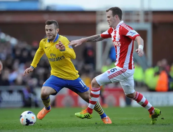 Framed Print : Jack Wilshere vs. Glenn Whelan: Battle in the Midfield - Stoke City vs. Arsenal, Premier League 2013-14 Framed Print : Jack Wilshere vs. Glenn Whelan: Battle in the Midfield - Stoke City vs. Arsenal, Premier League 2013-14