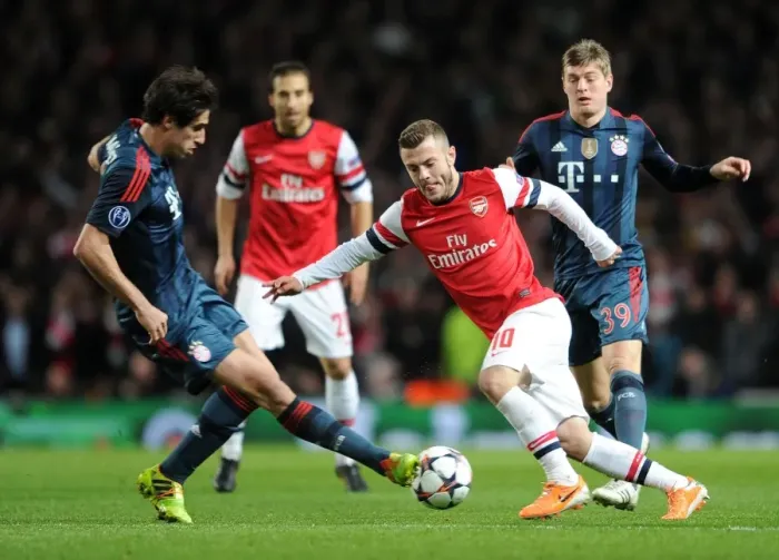 Framed Print : Jack Wilshere vs. Javier Martinez: Battle in the Midfield - Arsenal v FC Bayern Munich, UEFA Champions League 2013-14