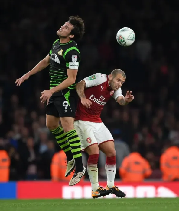 Framed Print : Jack Wilshere vs John Marquis: Arsenal vs Doncaster Rovers in Carabao Cup Clash
