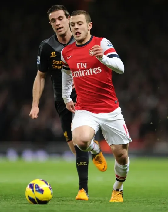 Framed Print : Jack Wilshere vs. Jordan Henderson: Intense Rivalry on the Arsenal v Liverpool Field (2012-13)