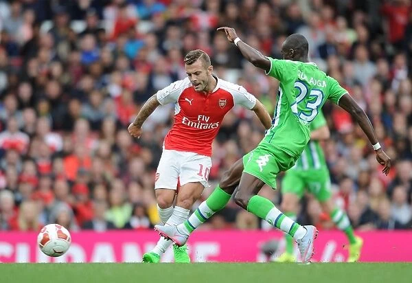 Jack Wilshere vs. Josuha Guilavogui: A Clash of Midfield Talents at the Emirates Cup