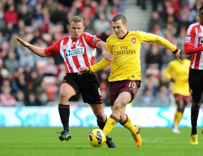 Framed Print : Jack Wilshere vs. Lee Catermole: Battle in the Midfield - Sunderland vs. Arsenal, Premier League 2012-13