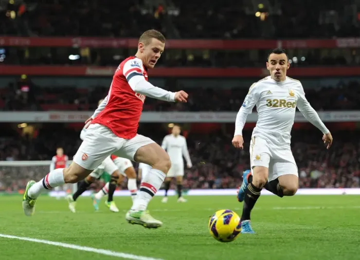 Framed Print : Jack Wilshere vs. Leon Britton: Battle for Ball Control - Arsenal v Swansea City, Premier League 2012-13 Framed Print : Jack Wilshere vs. Leon Britton: Battle for Ball Control - Arsenal v Swansea City, Premier League 2012-13