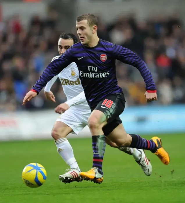 Framed Print : Jack Wilshere vs. Leon Britton: Battle in the FA Cup Third Round between Swansea and Arsenal Framed Print : Jack Wilshere vs. Leon Britton: Battle in the FA Cup Third Round between Swansea and Arsenal