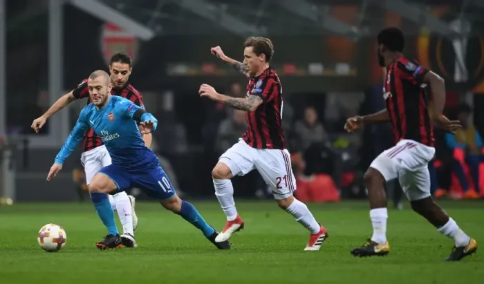 Framed Print : Jack Wilshere vs. Lucas Biglia: Battle in the Europa League - Arsenal vs. AC Milan Framed Print : Jack Wilshere vs. Lucas Biglia: Battle in the Europa League - Arsenal vs. AC Milan