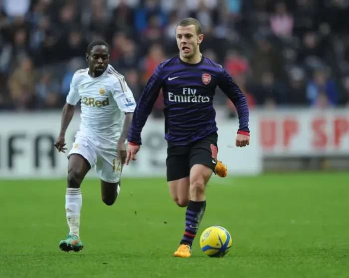 Framed Print : Jack Wilshere vs. Nathan Dyer: A Midfield Battle at Swansea FA Cup Match (Swansea vs. Arsenal 2012-13) Framed Print : Jack Wilshere vs. Nathan Dyer: A Midfield Battle at Swansea FA Cup Match (Swansea vs. Arsenal 2012-13)