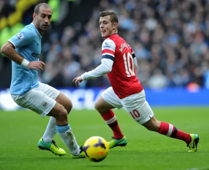 Framed Print : Jack Wilshere vs. Pablo Zabaleta: Battle at Etihad Stadium - Manchester City vs. Arsenal (2013-14) Framed Print : Jack Wilshere vs. Pablo Zabaleta: Battle at Etihad Stadium - Manchester City vs. Arsenal (2013-14)