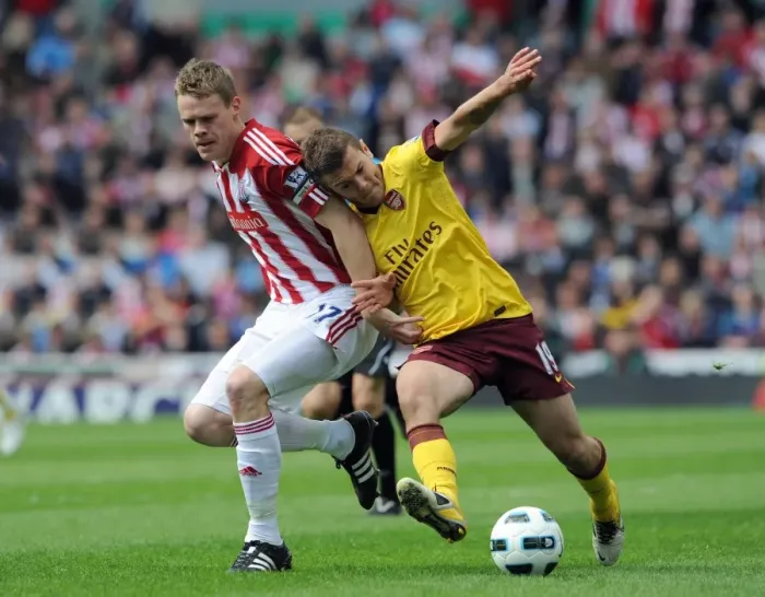 Framed Print : Jack Wilshere vs. Ryan Shawcross: Stoke City's Triumph Over Arsenal in the Barclays Premier League (8 / 5 / 11)