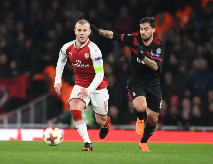 Framed Print : Jack Wilshere vs Suso: Battle in the Arsenal v AC Milan Europa League Clash