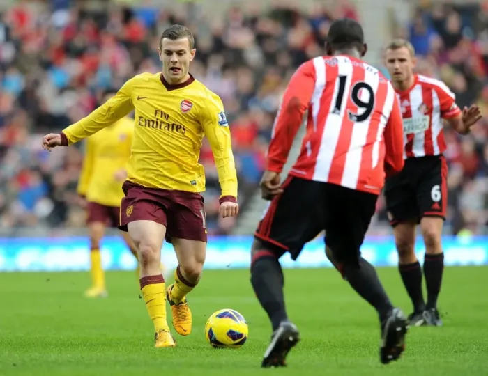 Framed Print : Jack Wilshere vs. Titus Bramble: Battle on the Football Field (Sunderland vs. Arsenal, 2012-13)