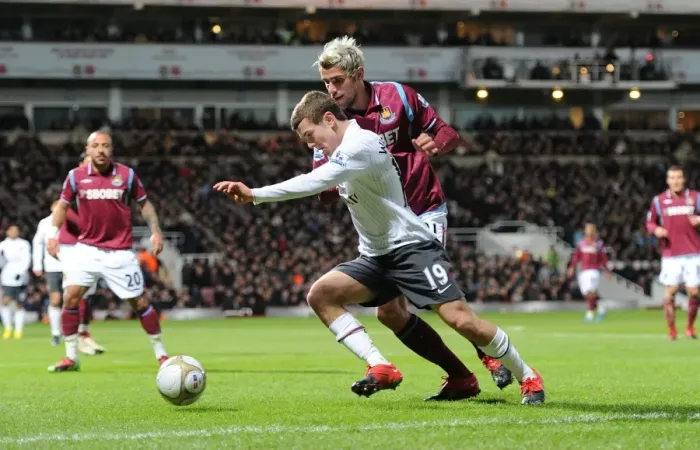 Framed Print : Jack Wilshere vs Valon Behrami: Arsenal's Win at West Ham United in FA Cup Third Round, 2010