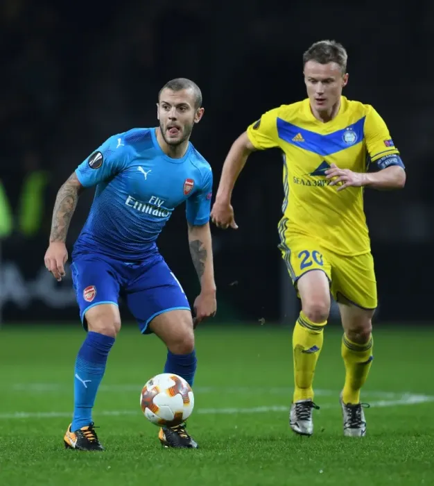 Framed Print : Jack Wilshere vs Vitali Rodionov: Battle in the Europa League between Arsenal and BATE Borisov
