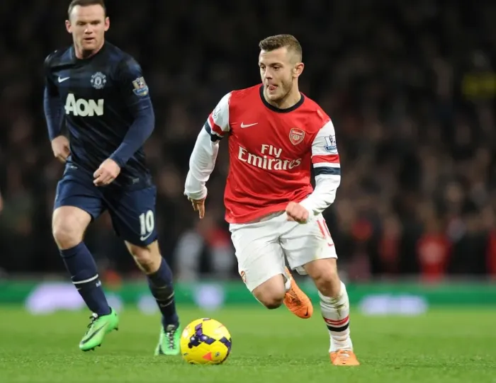 Framed Print : Jack Wilshere vs Wayne Rooney: Battle in the Midfield - Arsenal vs Manchester United, Premier League 2013-14