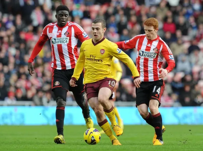 Framed Print : Jack Wilshere's Agile Moves: Outmaneuvering Colback and N'Diaye (Sunderland vs Arsenal, 2013) Framed Print : Jack Wilshere's Agile Moves: Outmaneuvering Colback and N'Diaye (Sunderland vs Arsenal, 2013)