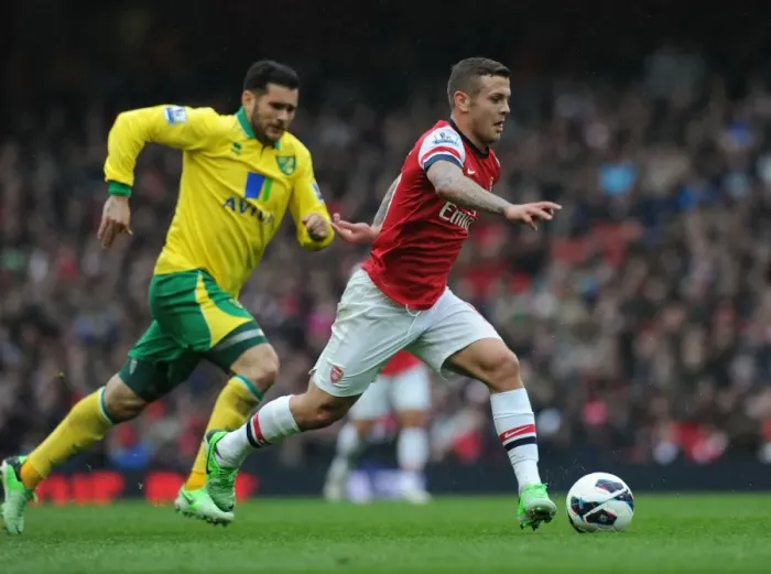 Framed Print : Jack Wilshere's Agile Moves: Outsmarting Norwich's Bradley Johnson in the 2012-13 Arsenal Showdown