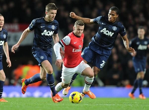 Jack Wilshere's Agile Outmaneuver: Arsenal Star Outwits Michael Carrick and Antonio Valencia (2013-14)