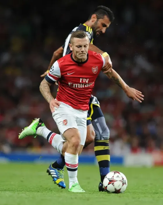 Framed Print : Jack Wilshere's Dominant Moment: Arsenal's Champions League Victory over Selcuk Sahin (2013)