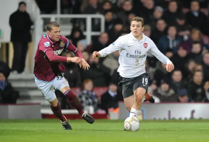 Framed Print : Jack Wilshere's Game-Winning Goal: Arsenal Advances in FA Cup over West Ham